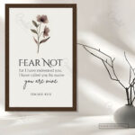 Close-up of Isaiah 43:1 scripture text on acrylic print – "you are mine" in flowing script – Christian wall décor